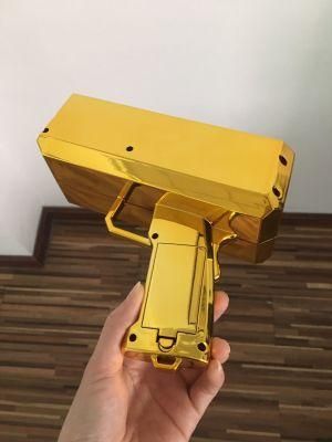 2021 Trending Products Metallic Gold Money Gun Toy Spray Cash Money Custom Logo Packaging Throwing Gun Money Shooter