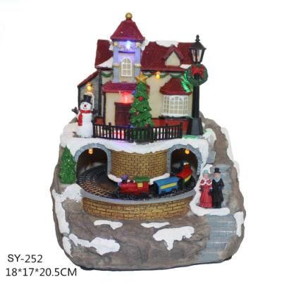 Custom Made Hot New Product Polyresin Christmas LED House with Turning Train &amp; Music Ornaments