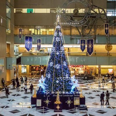 Super Size Public Christmas Tree with Bright Garlands and Gift Boxes